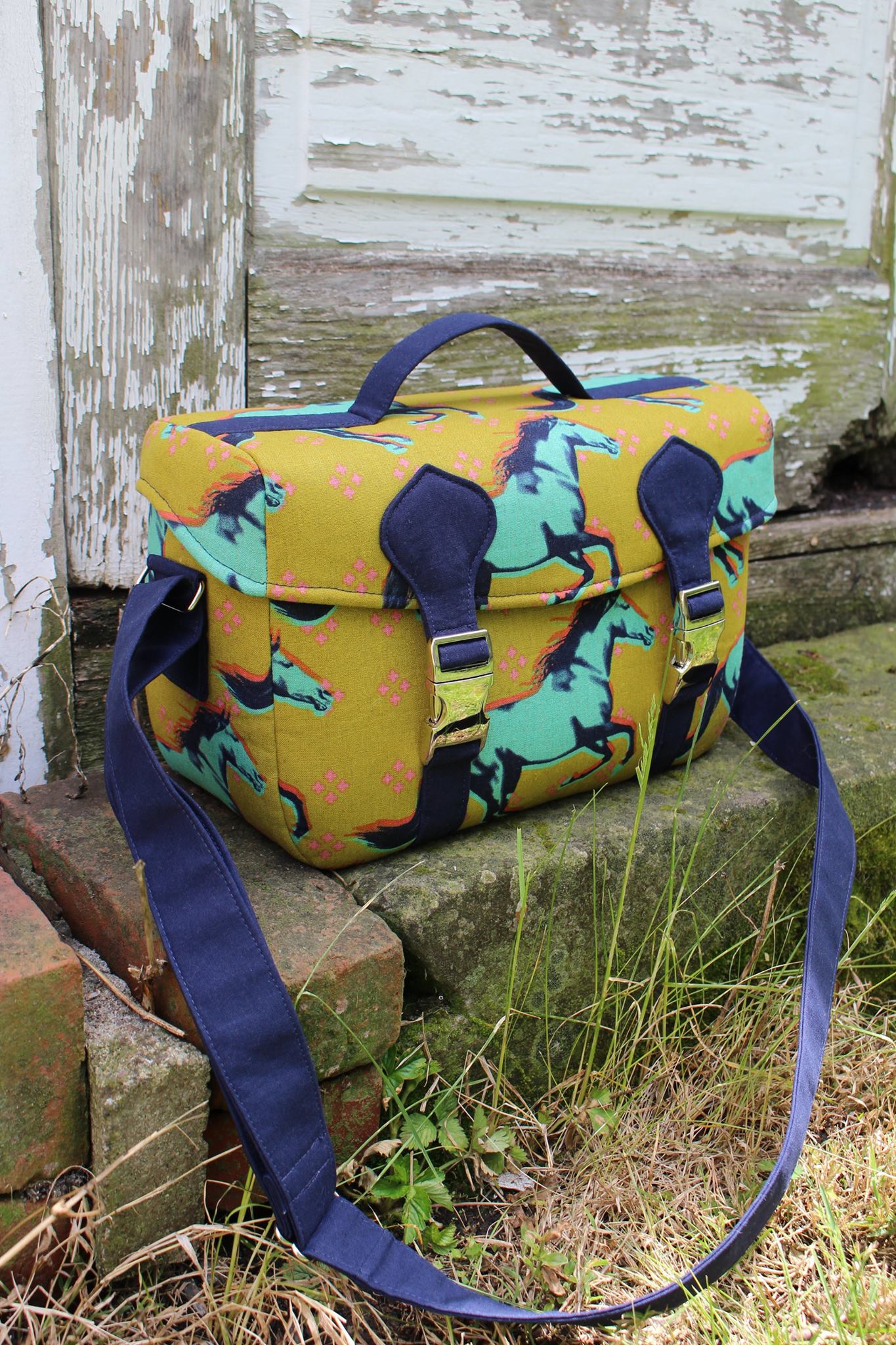 Camille Camera Bag Sewing Pattern  made by Jennifer Greene horse fabric with blue strap