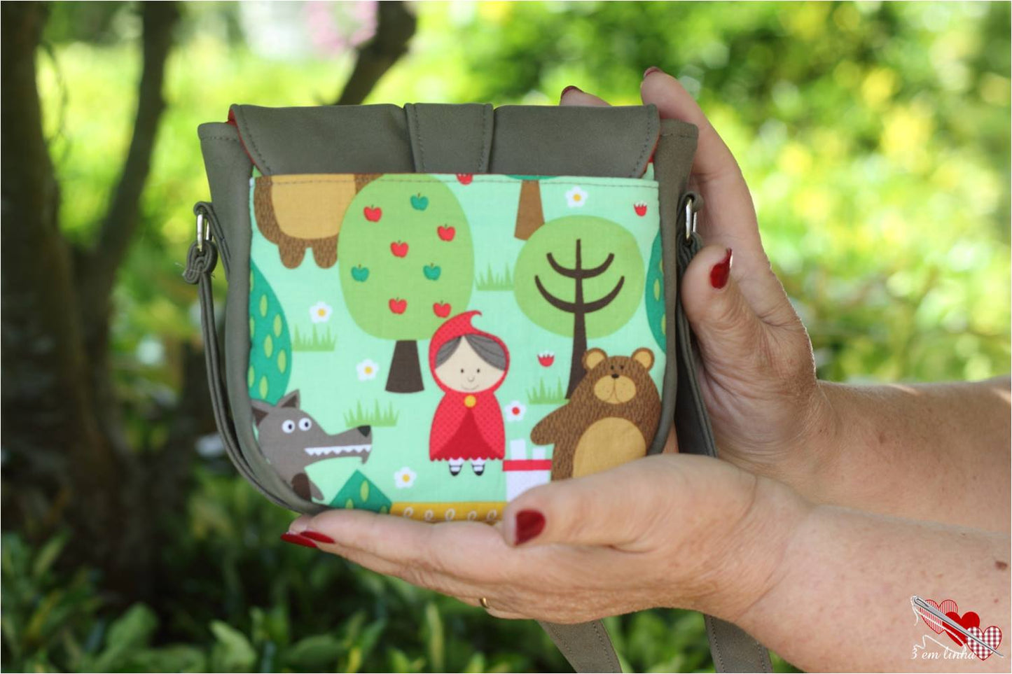 Dollie Mini Crossbody Sewing Pattern made by MMaria Luisa Santos Red hiding hood fabric