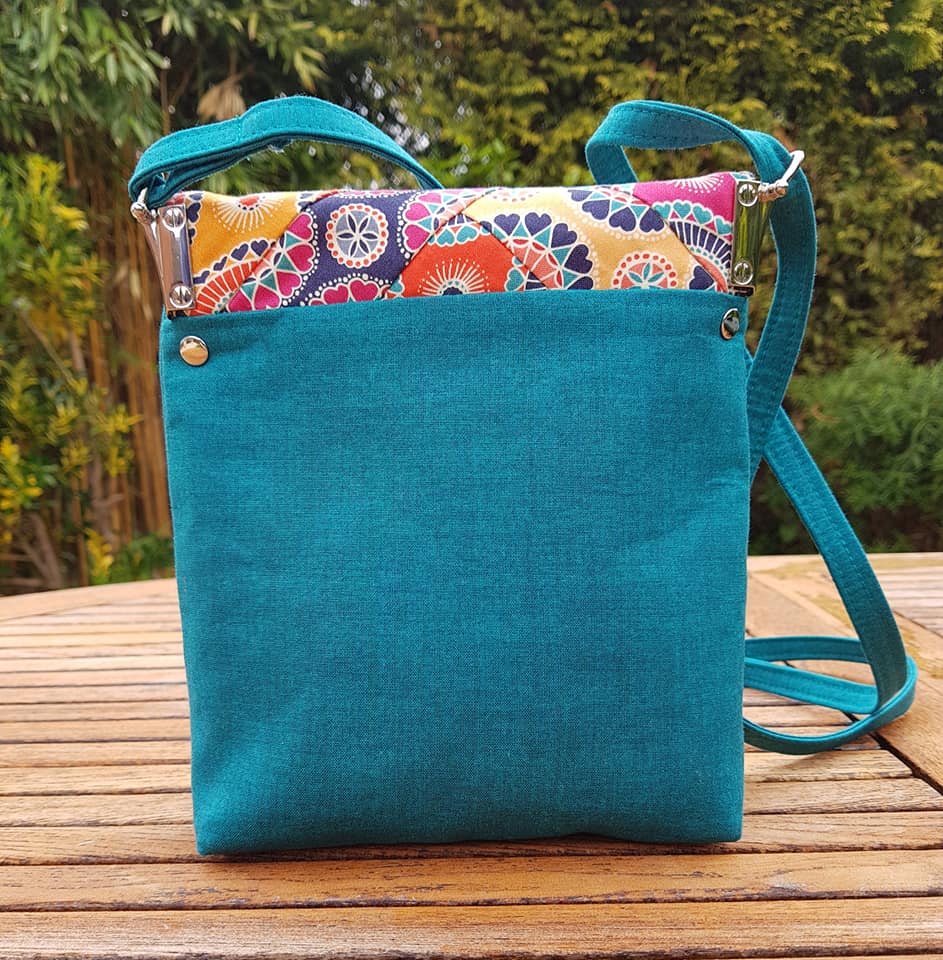 The Crossbody Bag PDF Sewing Pattern rear view with blue fabric