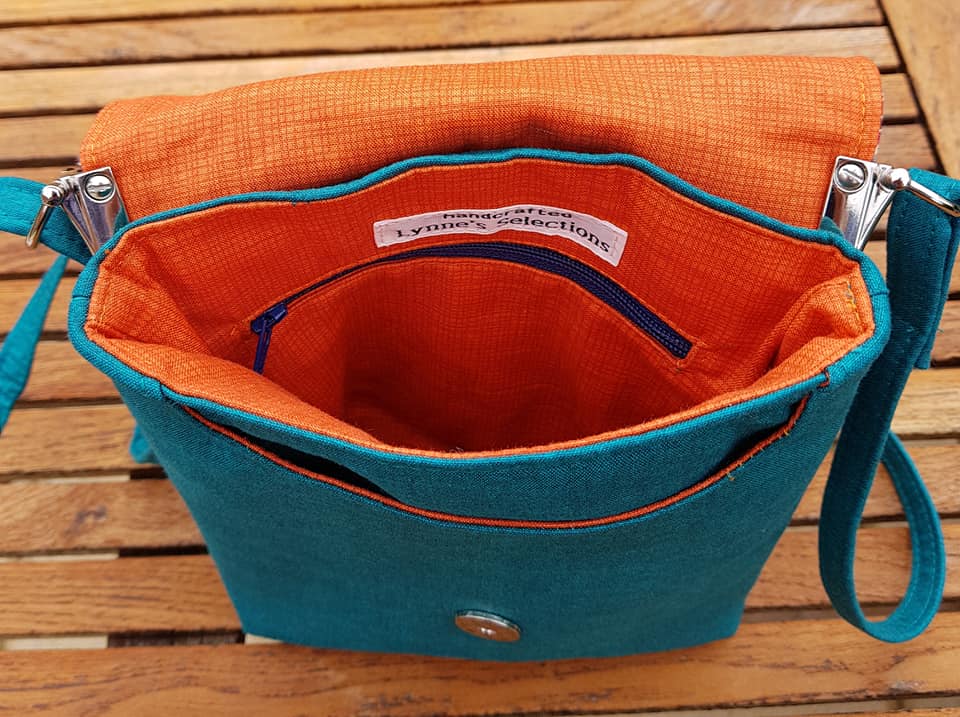 The Crossbody Bag PDF Sewing Pattern rear view with orange interior