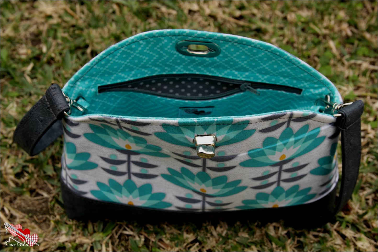 Marianne Clutch & Wristlet Sewing pattern made by Maria Luisa Santos blue floral fabric