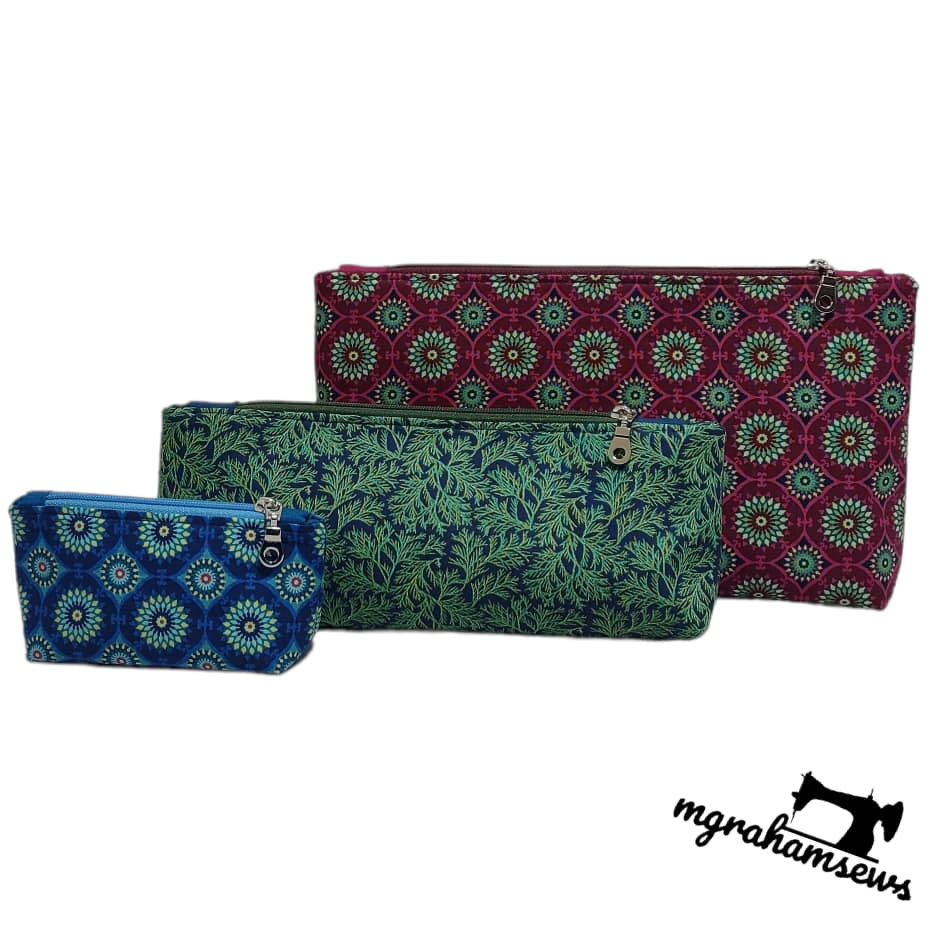 Three patterned bags in green, blue, and red on a white background with 'mghamsews' branding.