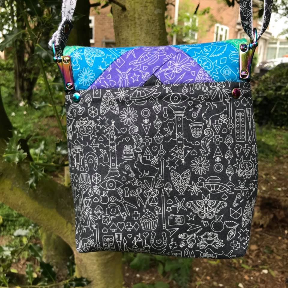 The Crossbody Bag PDF Sewing Pattern rear view with white and black fabric