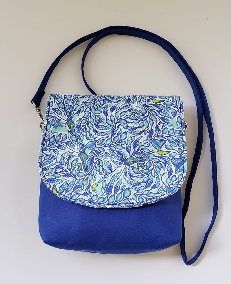 The Crossbody Bag PDF Sewing Pattern rear view with printed blue fabric
