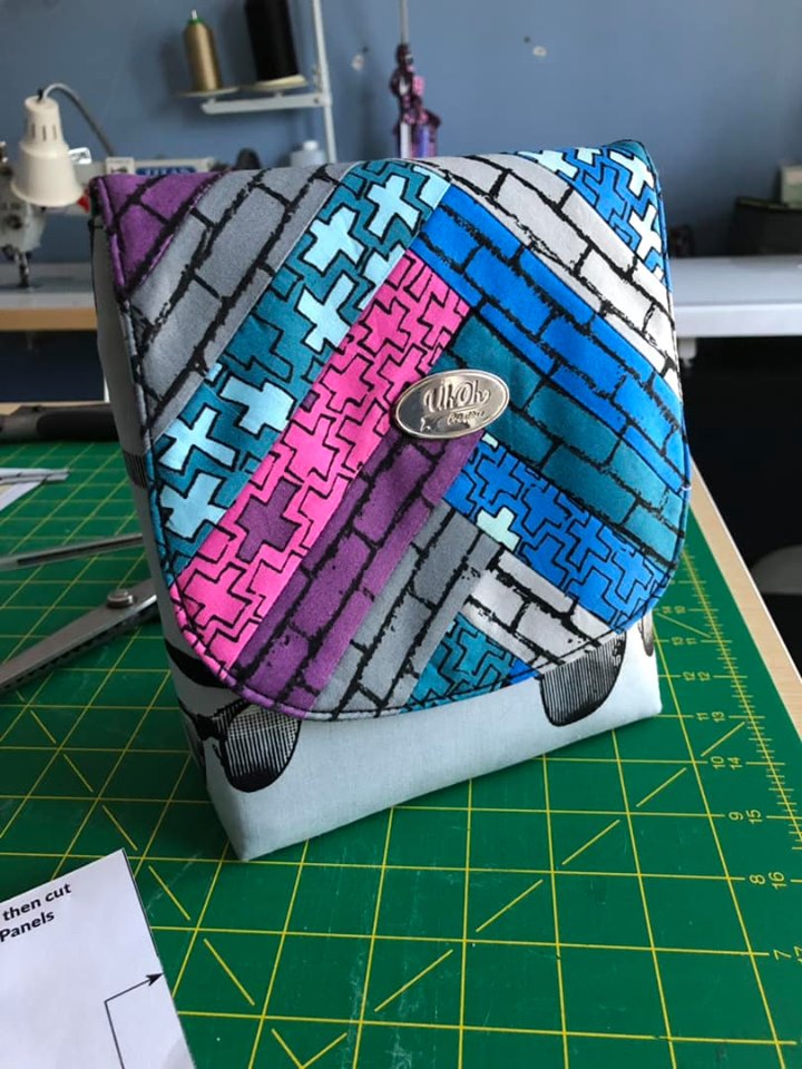 The Crossbody Bag PDF Sewing Pattern rear view with bold printed fabric