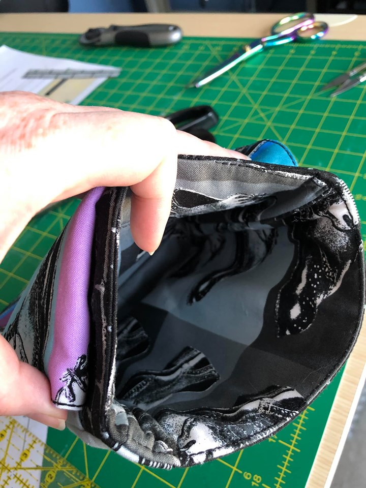 The Crossbody Bag PDF Sewing Pattern rear view with bold printed fabric interior view