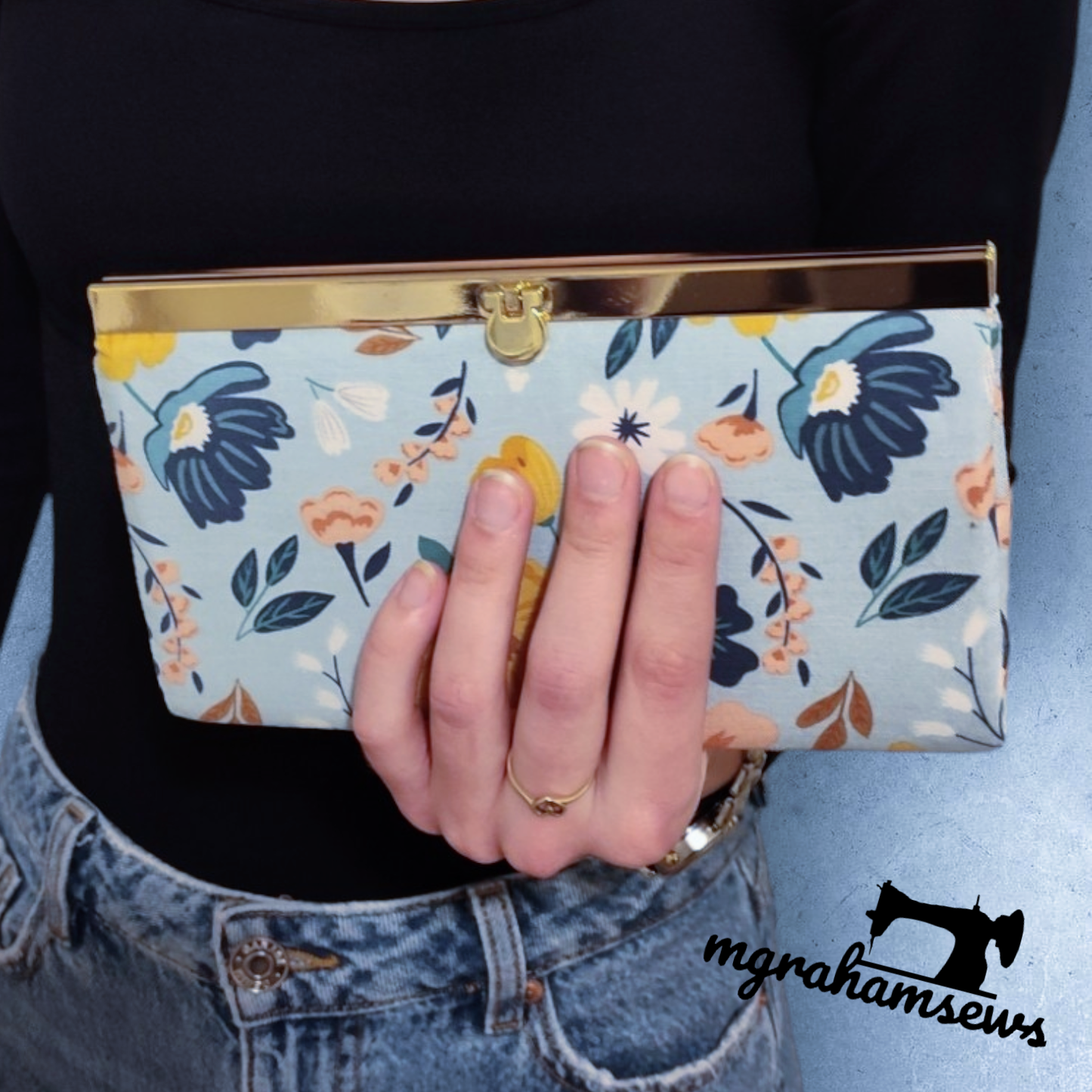 Wonder Wallet being held by Michelle