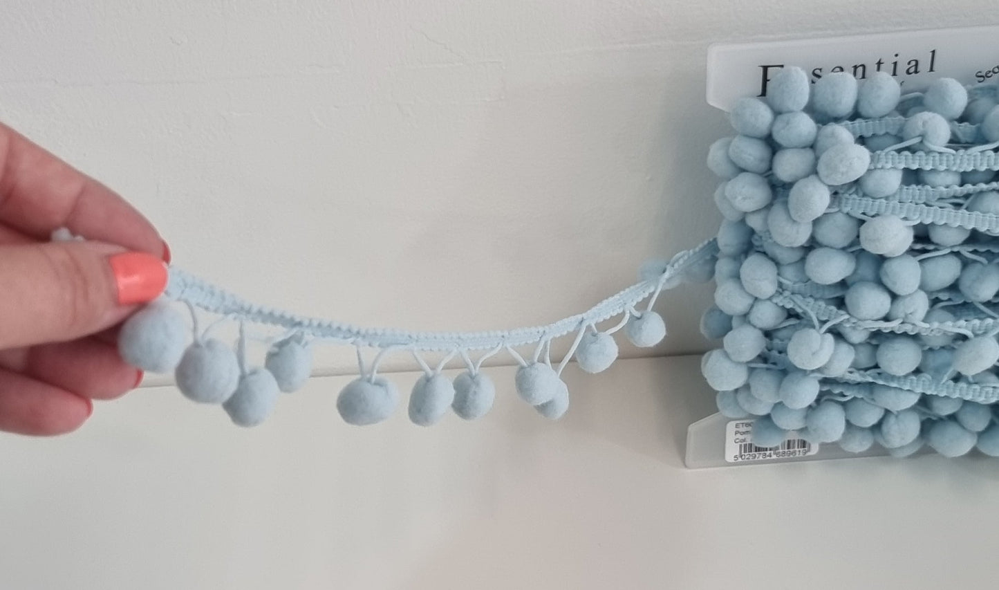 20mm pom pom trim in pale blue