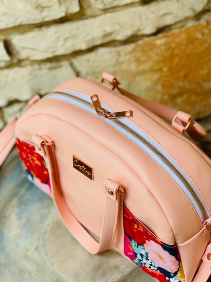 Betty Bowler Bag Sewing Pattern  made by Monica Bernstine Castine  pink floral top view