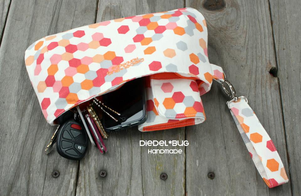  Coraline Clutch Sewing pattern  made by Diedel Bug Handmade with items inside 