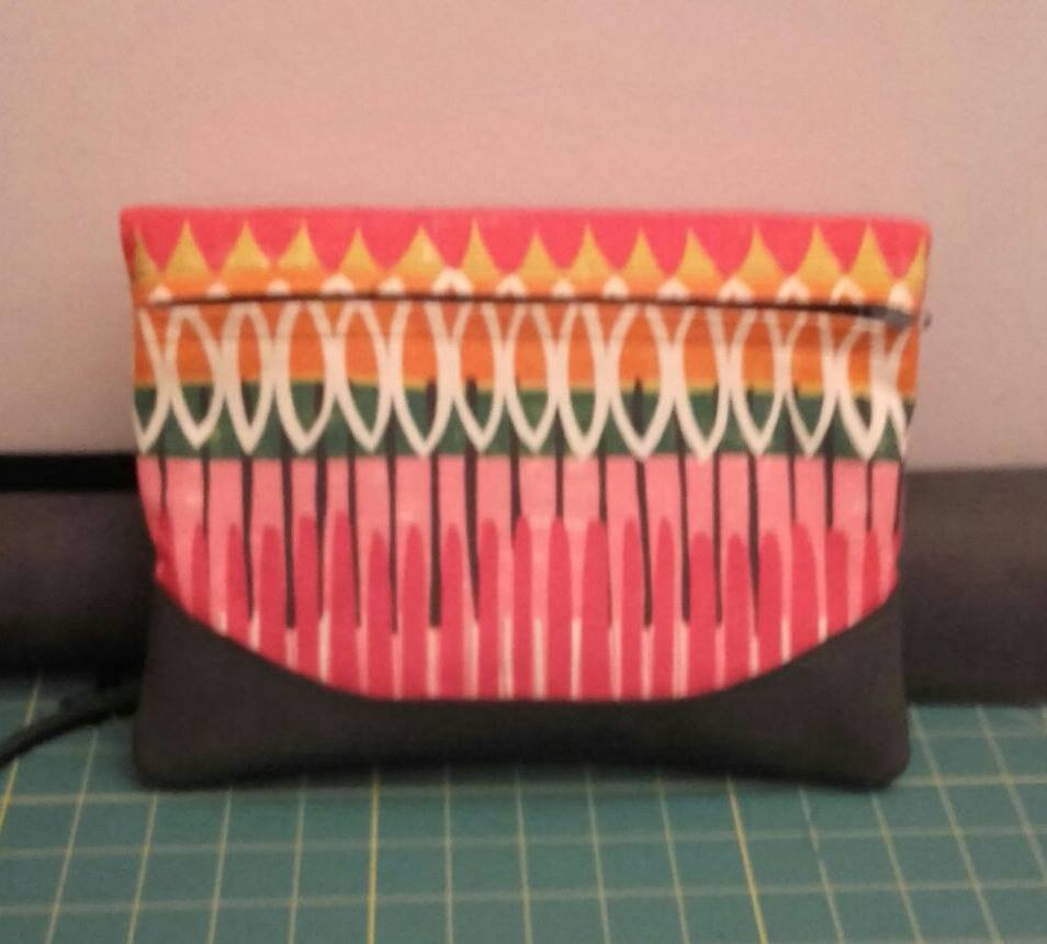 Heidi Foldover Clutch & Wristlet Sewing Pattern  made by Maria Luisa Santos colourful fabric