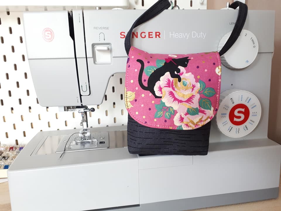 The Crossbody Bag PDF Sewing Pattern cat and floral fabric 