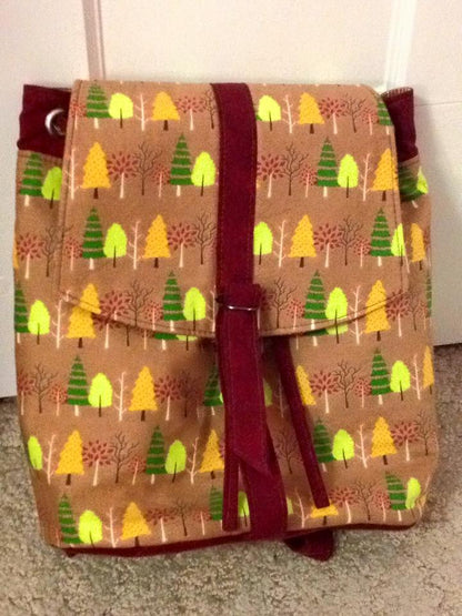 Lucy Backpack Sewing Pattern  made by Elizabeth Bolton - Christmas tree fabric