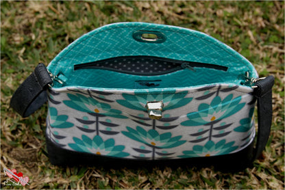 Marianne Clutch & Wristlet Sewing pattern made by Maria Luisa Santos blue floral fabric