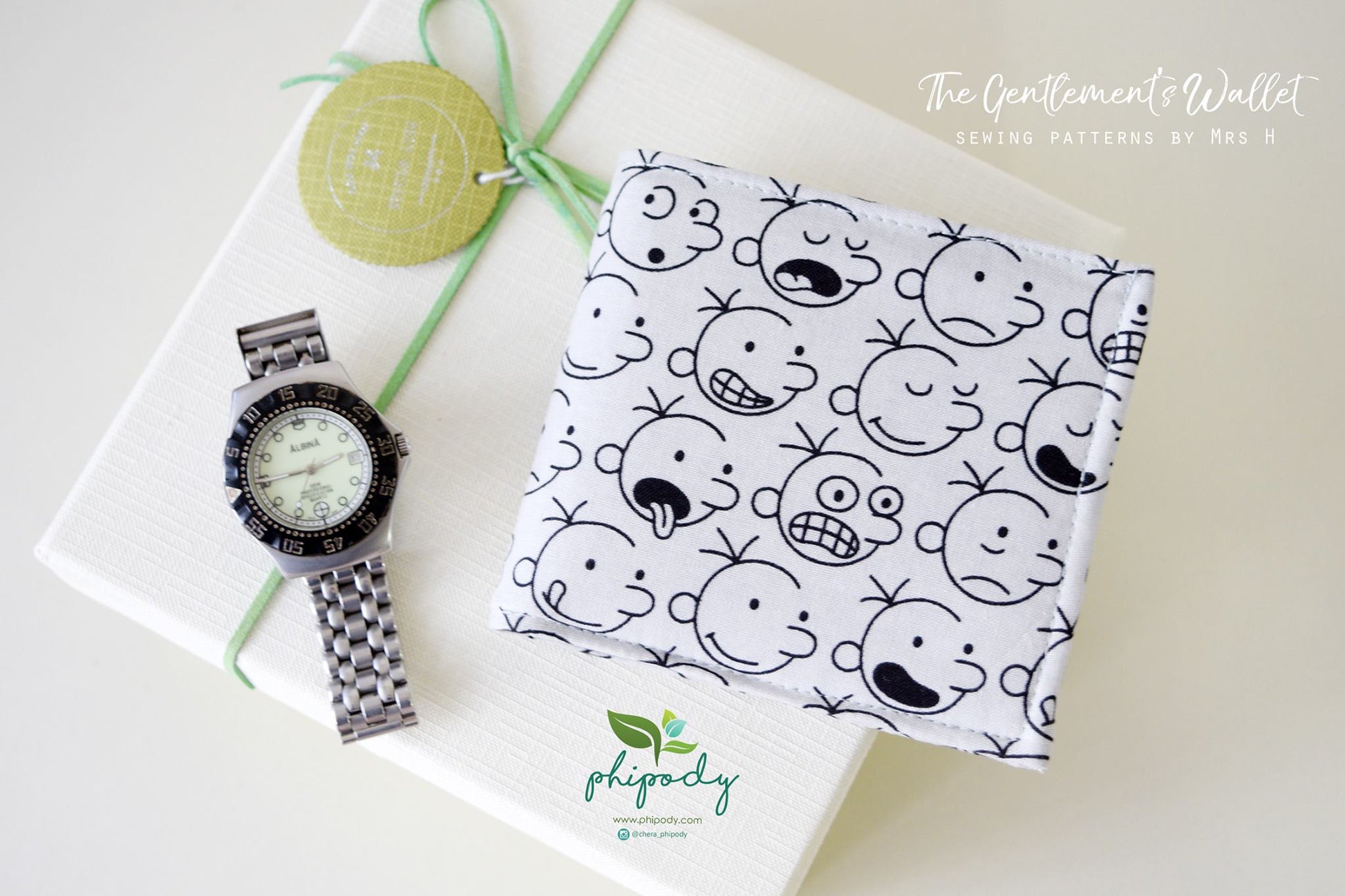 Sewing pattern by Mrs H The Gentlemans Wallet, comedy face fabric