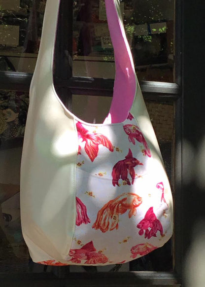 Summer Festival Sling Sewing Pattern  made by Michelle Tripp Koi fabric