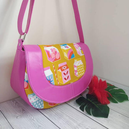 The Sassy Saddlebag PDF Sewing Pattern retro carton print with pink trim 