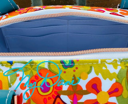 Inside of the Brooklyn Bag from Swoon Sewing Patterns, made by Kimberly Cummins from MyDani Bags, showing card slots added by Kim