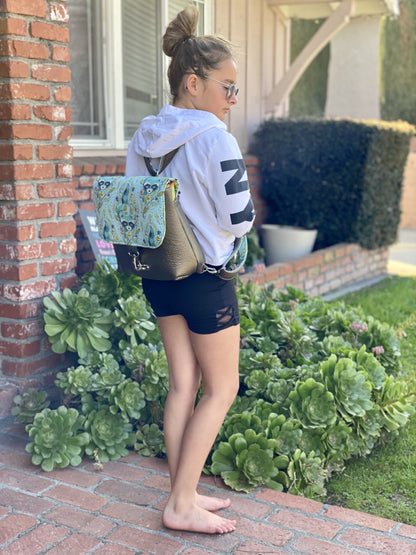 The Interchange Crossbody Backpack, made by Katie Mehta